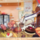 Window signs in a shop with clear, visible text and design.