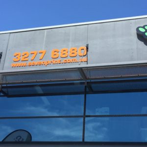 3D letter sign in a shop setting with the letters in a sleek 3D design.